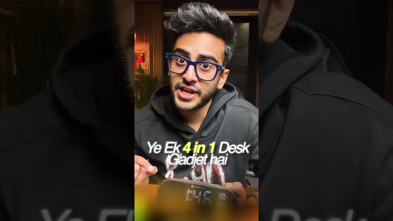 A creator demonstrating a desk gadget in a product review